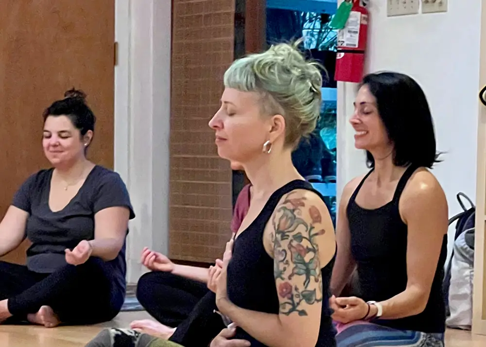 Slow Power Retreat participants meditating